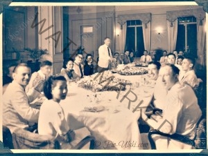 Friends gathered around the dining table at the Peninsula Hotel